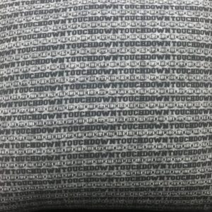 Black and Grey stripes with the word Touchdown and alternate rows of footballs.